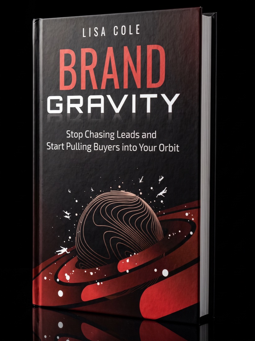Brand Gravity hardcover, standing on black.